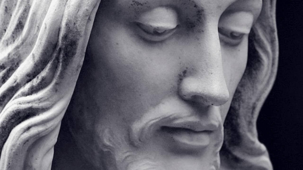 a closeup on a statue of Jesus - homosexuality